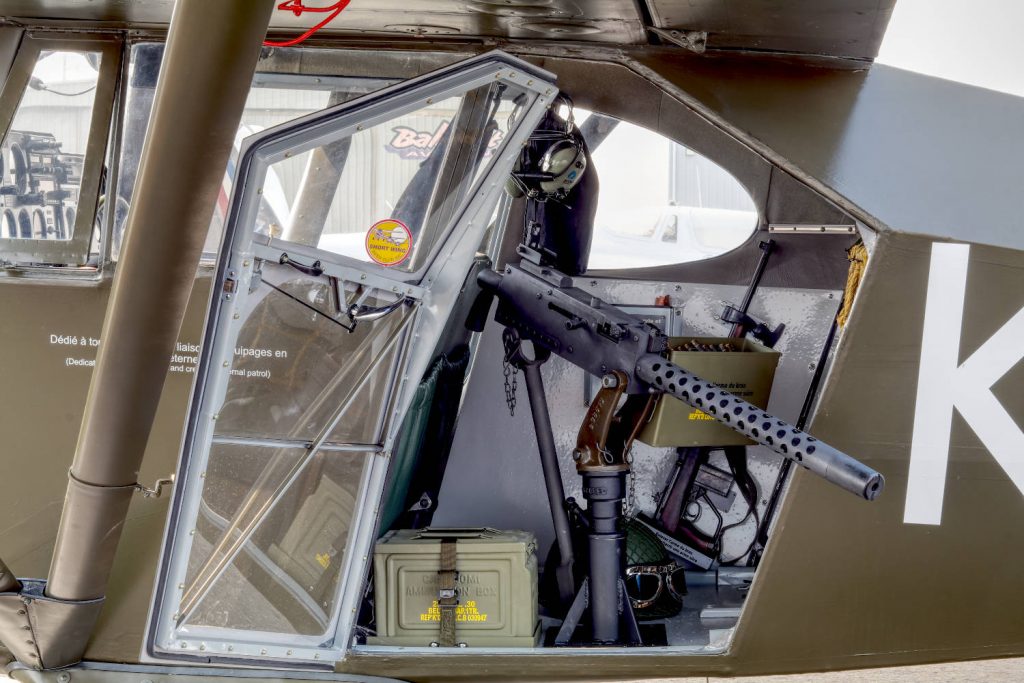 The rear door removed gave excellent field of fire for ground support missions. The weapon of choice was the WW2 US Army Browning 30 Cal air cooled machine gun.